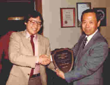 Former Pres. Clifford Pong honoring Herbert Chew