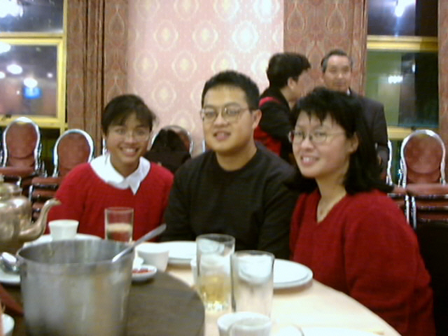 Joyce, Raymond, Jenny Kwan at New Year's banquet 